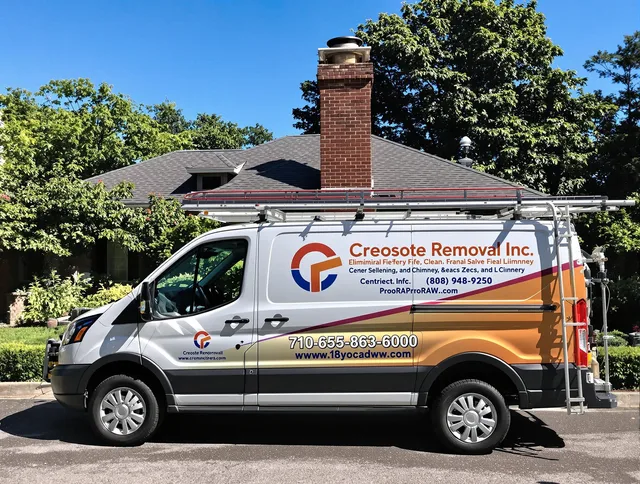 Waterford Chimney Sweep technician removing creosote safely in Waterford, CT